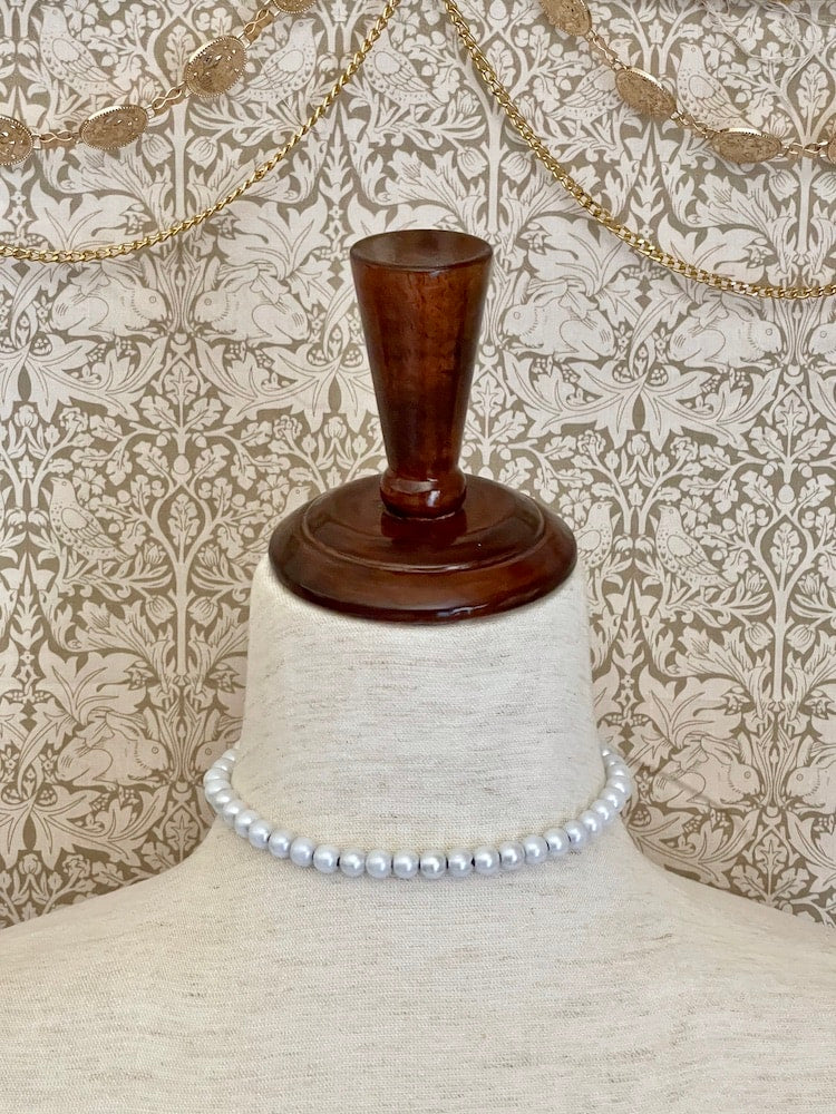 A handmade historically inspired victorian pearl beaded choker necklace in sheer black ribbon.