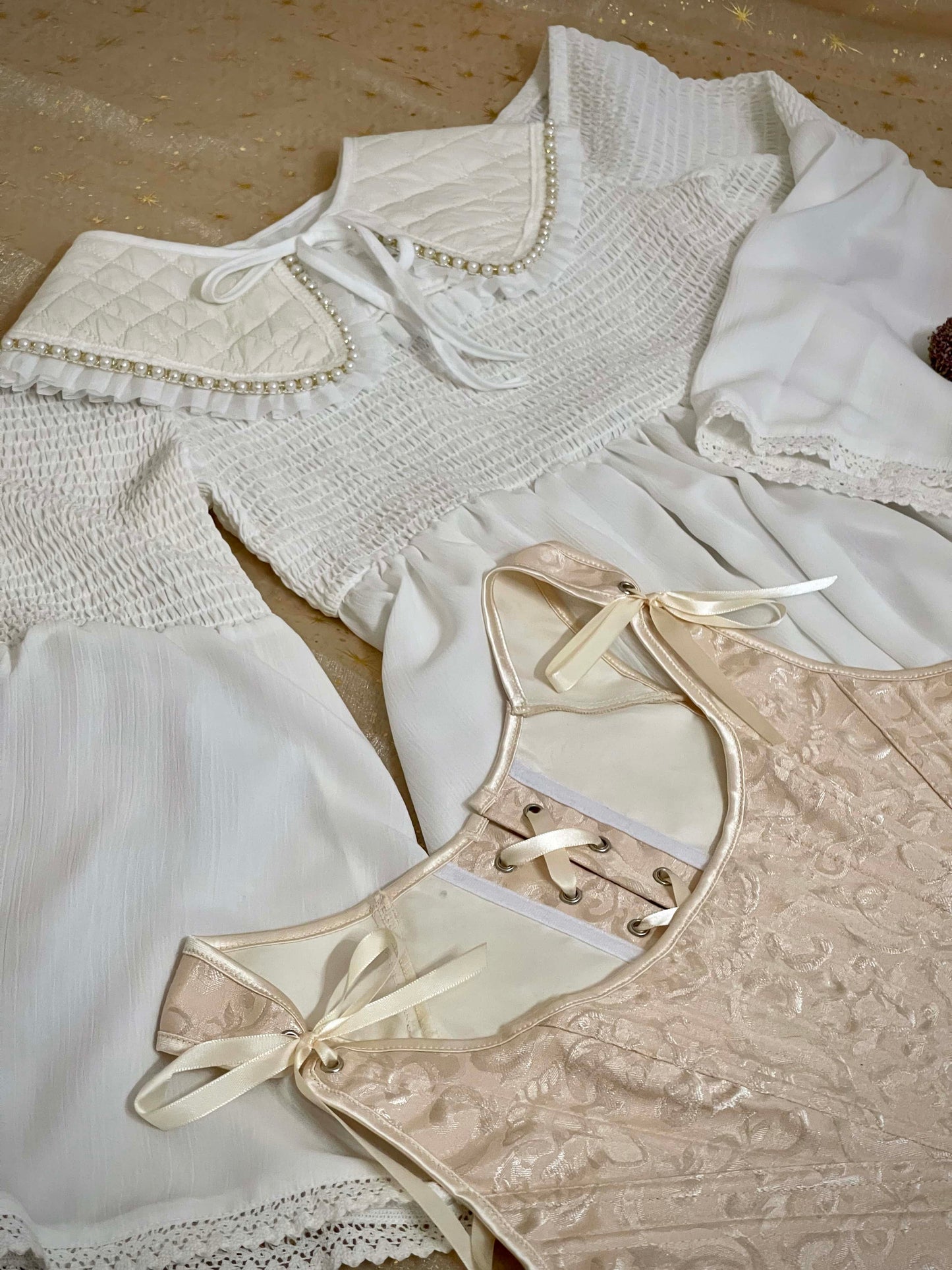 Details of a historical fashion clothing and accessories style bundle mystery bag, including medieval, renaissance, baroque, tudor, rococo, regency, Victorian, Edwardian and fantasy styles.