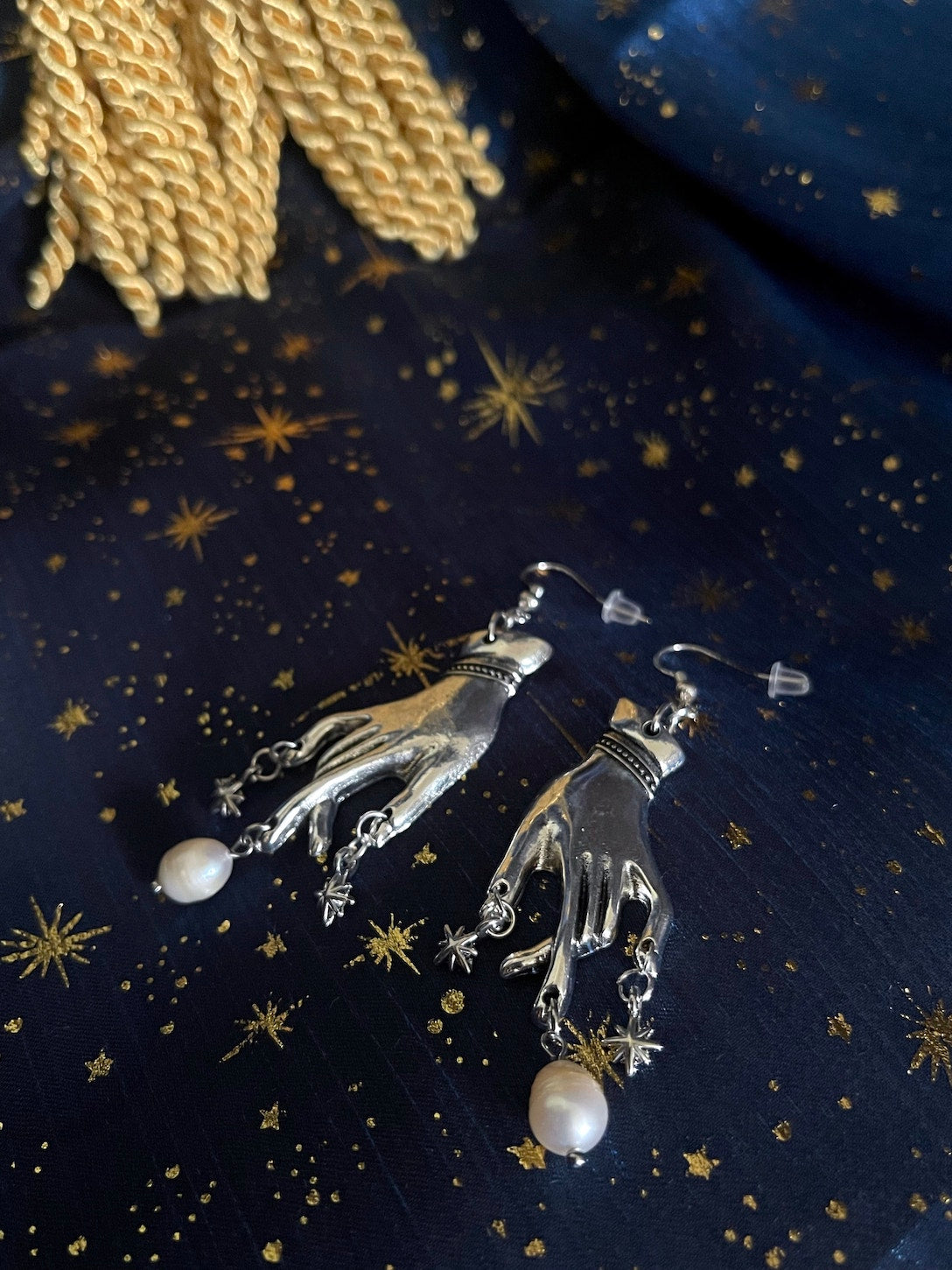 A Handmade pair of Historically Inspired Medieval Hand Pendant earrings with Real Baroque Pearl Dangles and Celestial Star Charms in Silver.