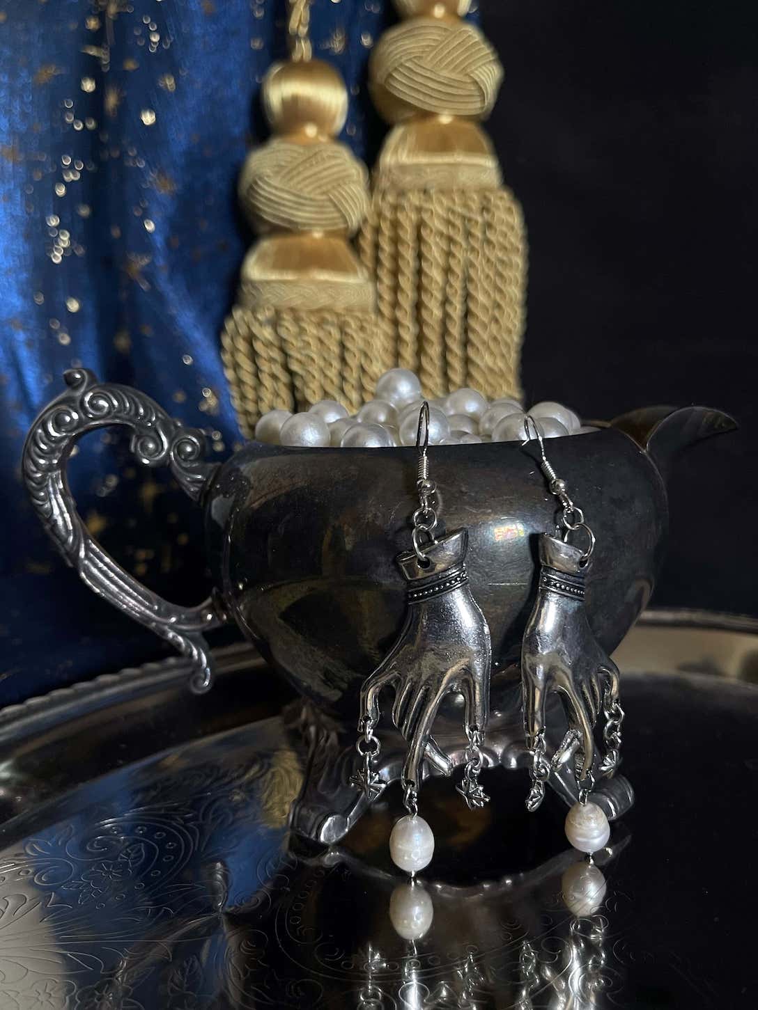 A Handmade pair of Historically Inspired Medieval Hand Pendant earrings with Real Baroque Pearl Dangles and Celestial Star Charms in Silver.