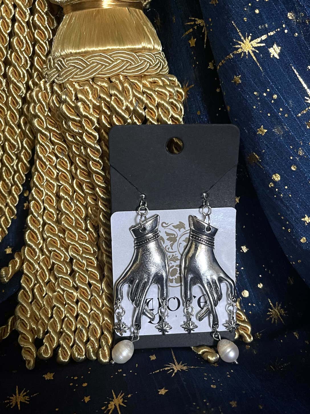 A Handmade pair of Historically Inspired Medieval Hand Pendant earrings with Real Baroque Pearl Dangles and Celestial Star Charms in Silver.