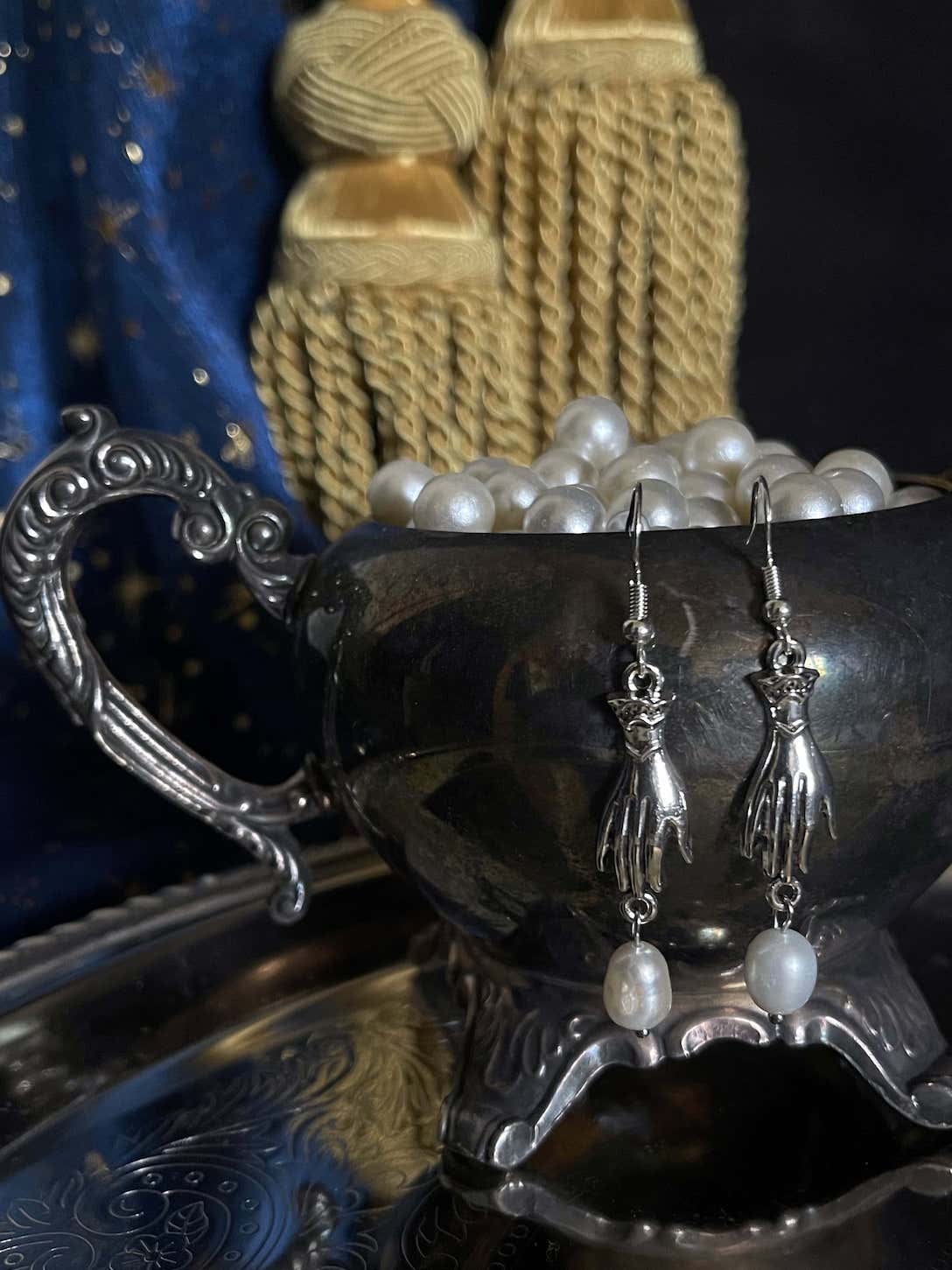 The Hand of Whimsy Earrings in Silver