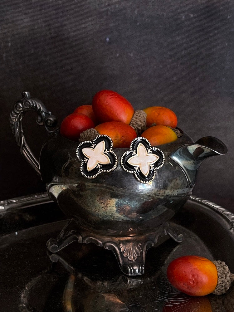 Historically Inspired Renaissance Quatrefoil Stud Earrings in Black x Ivory on an antique dish autumn display