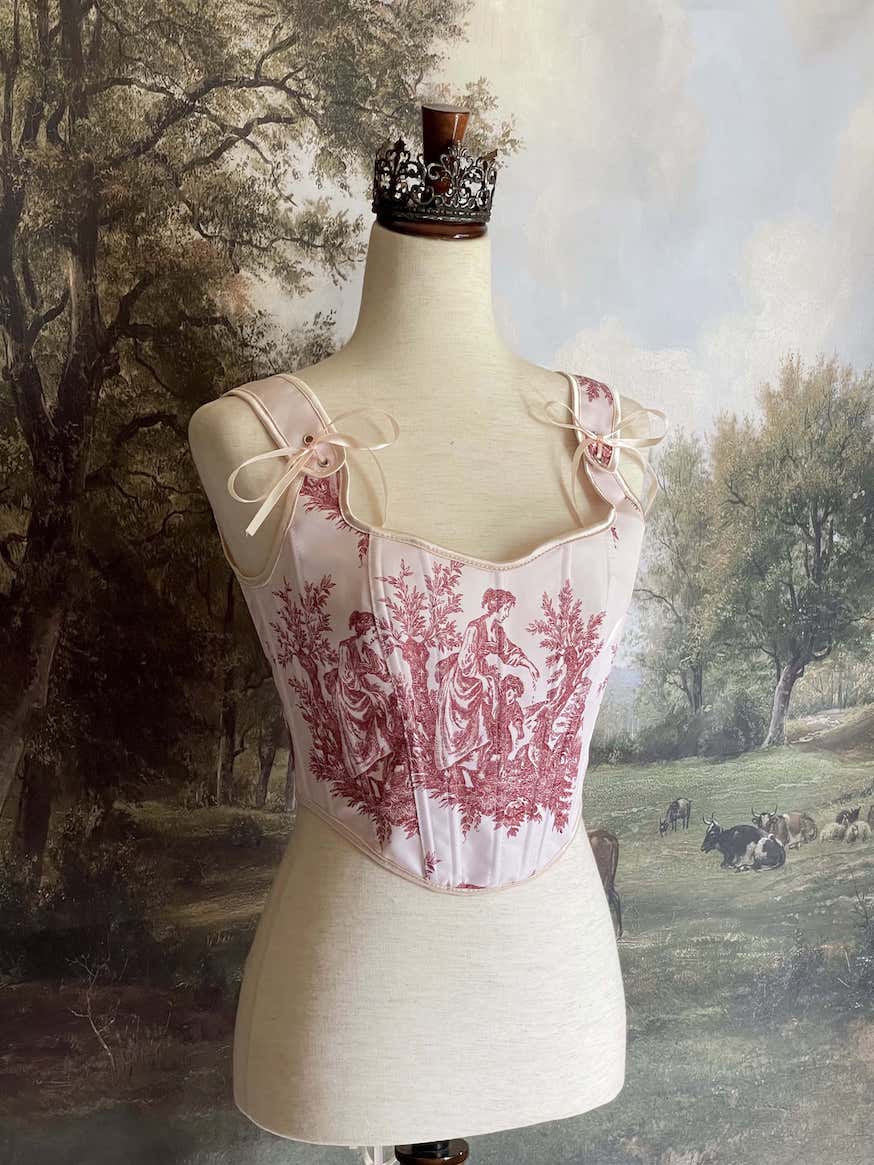 A Historically inspired pair of Baroque & Rococo Era Ivory and Red Countryside Toile de juoy Corset Stays.