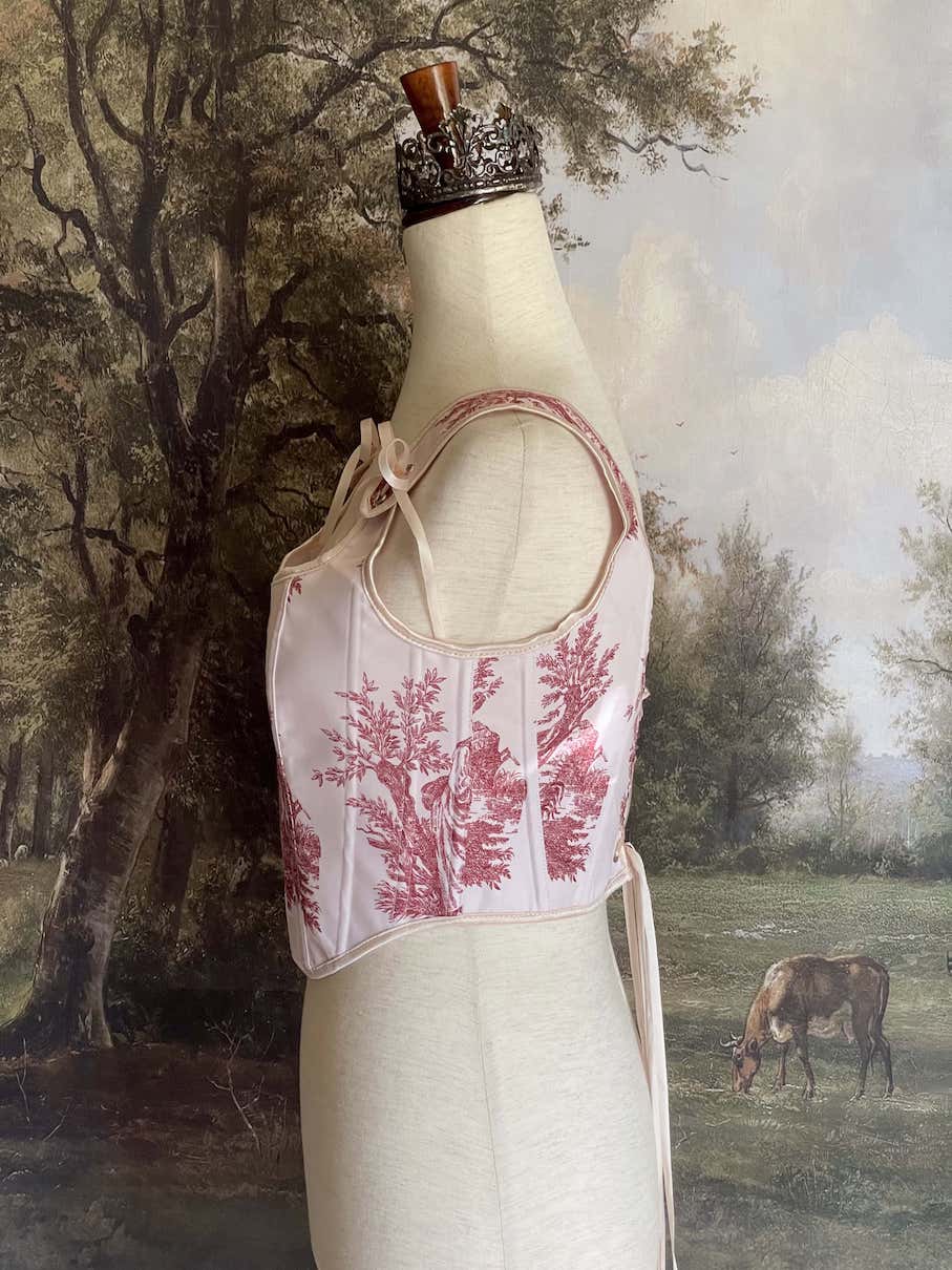 A Historically inspired pair of Baroque & Rococo Era Ivory and Red Countryside Toile de juoy Corset Stays.