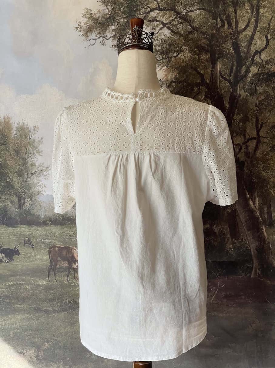 A Historically inspired edwardian style short sleeve blouse with eyelet lace yoke and scalloped lace collar.