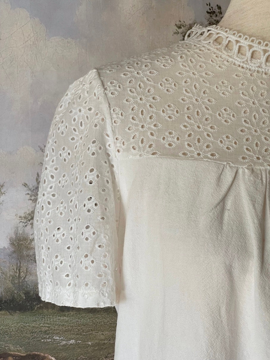 A Historically inspired edwardian style short sleeve blouse with eyelet lace yoke and scalloped lace collar.