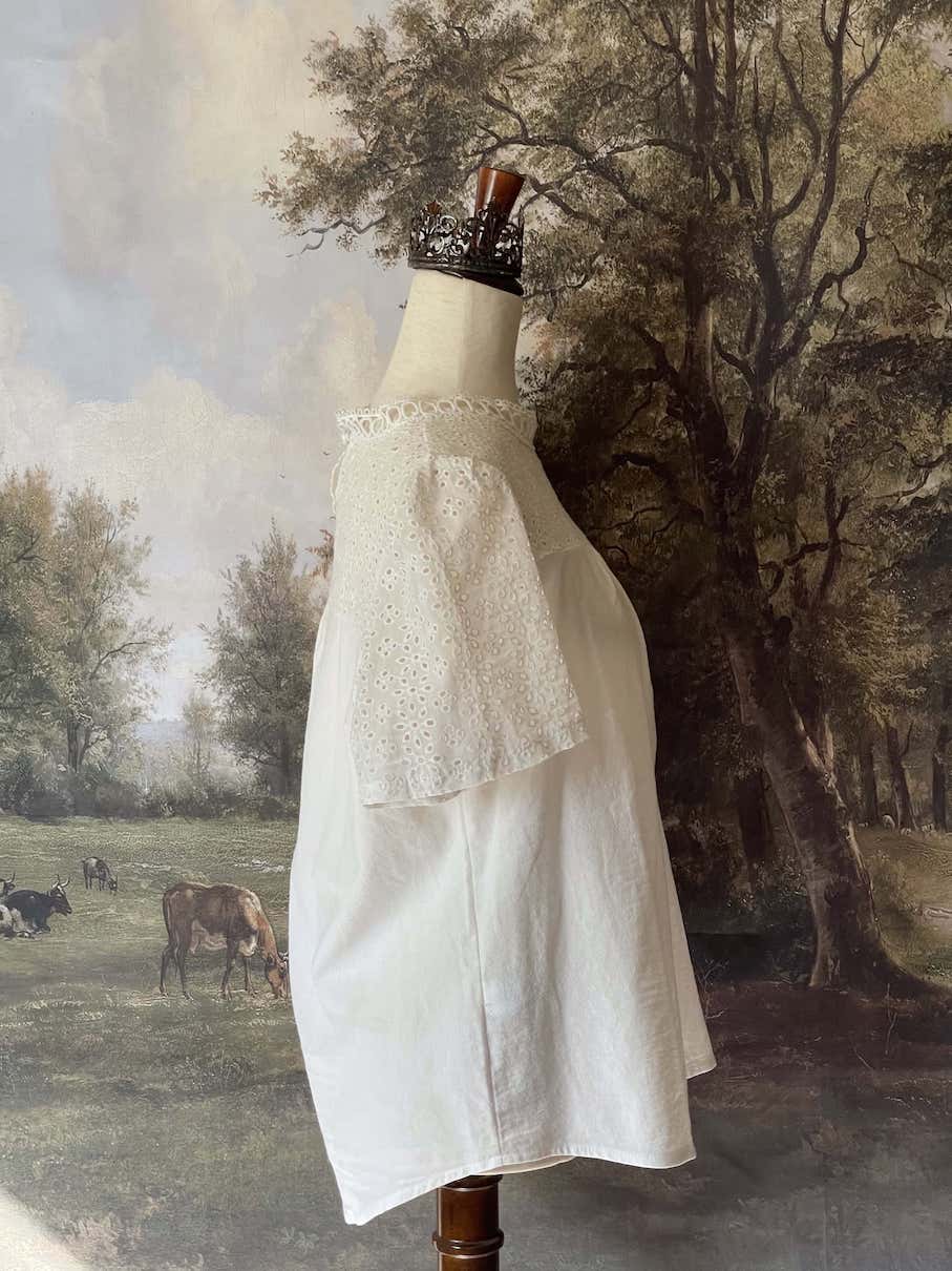 A Historically inspired edwardian style short sleeve blouse with eyelet lace yoke and scalloped lace collar.
