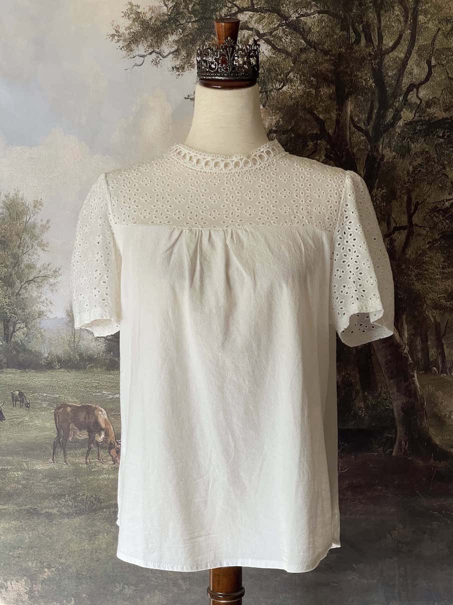 A Historically inspired edwardian style short sleeve blouse with eyelet lace yoke and scalloped lace collar.