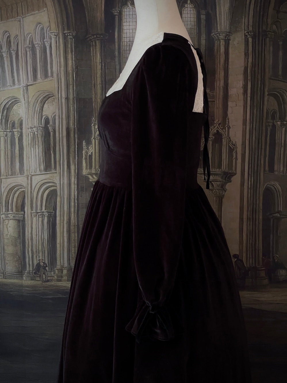 A Historically Inspired Tudor Fashion inspired Bustier Midi-maxi Dress with Lace Trim and bishop sleeves in Gothic Black Velvet