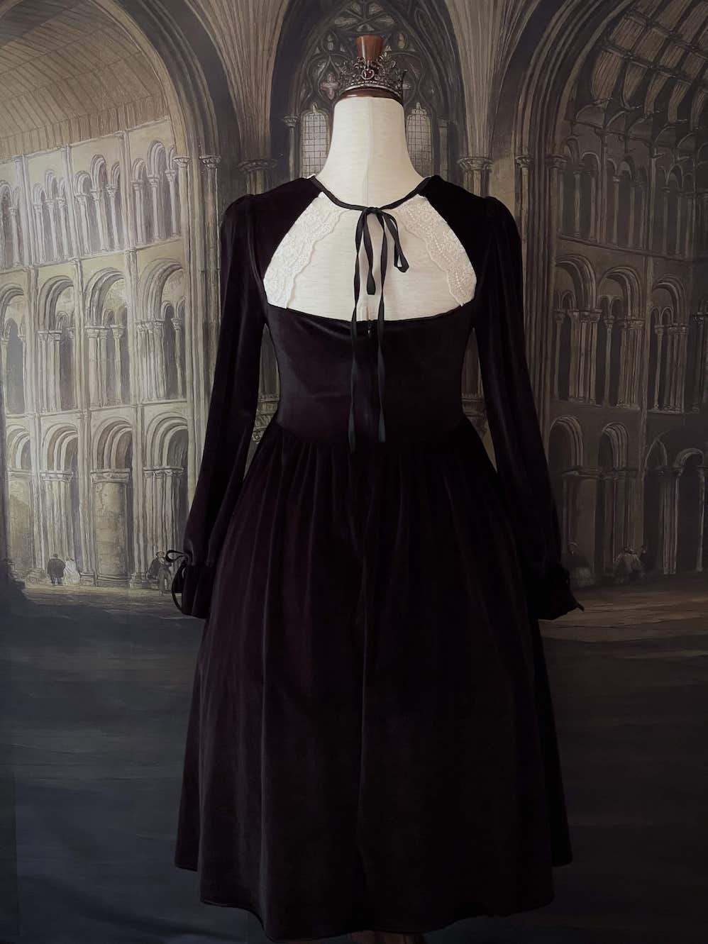 A Historically Inspired Tudor Fashion inspired Bustier Midi-maxi Dress with Lace Trim and bishop sleeves in Gothic Black Velvet