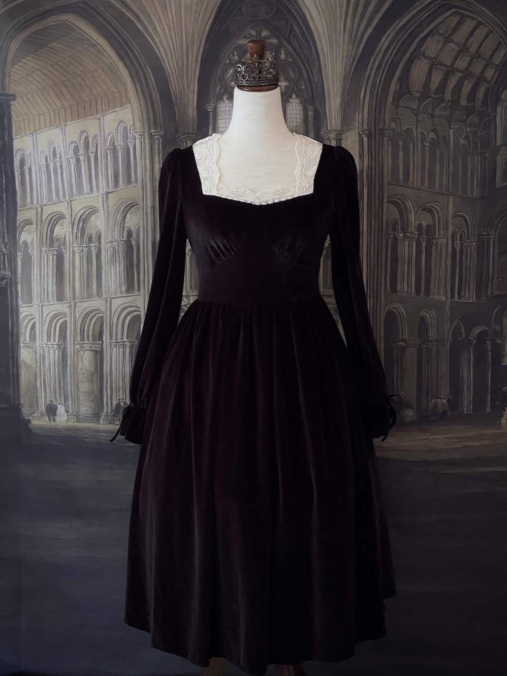 A Historically Inspired Tudor Fashion inspired Bustier Midi-maxi Dress with Lace Trim and bishop sleeves in Gothic Black Velvet