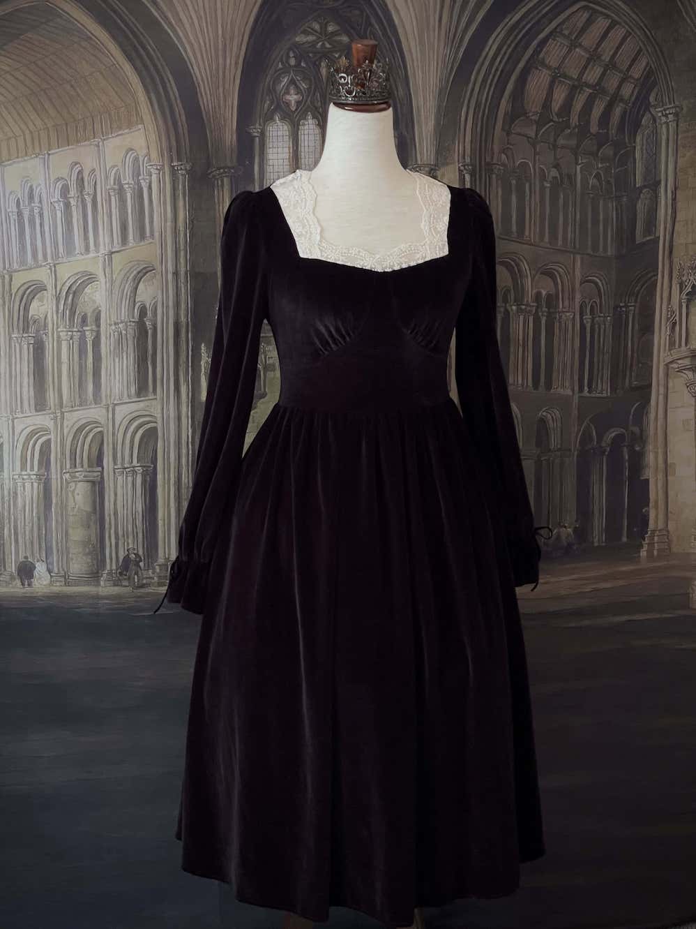 A Historically Inspired Tudor Fashion inspired Bustier Midi-maxi Dress with Lace Trim and bishop sleeves in Gothic Black Velvet