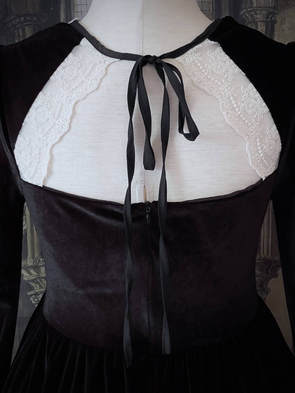 A Historically Inspired Tudor Fashion inspired Bustier Midi-maxi Dress with Lace Trim and bishop sleeves in Gothic Black Velvet