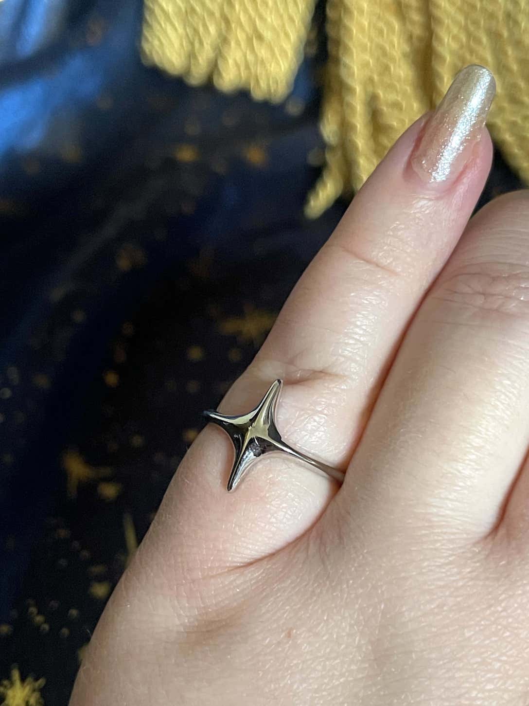 A Historically Inspired Celestial North Star Ring in Silver, adjustable band, nickel free.