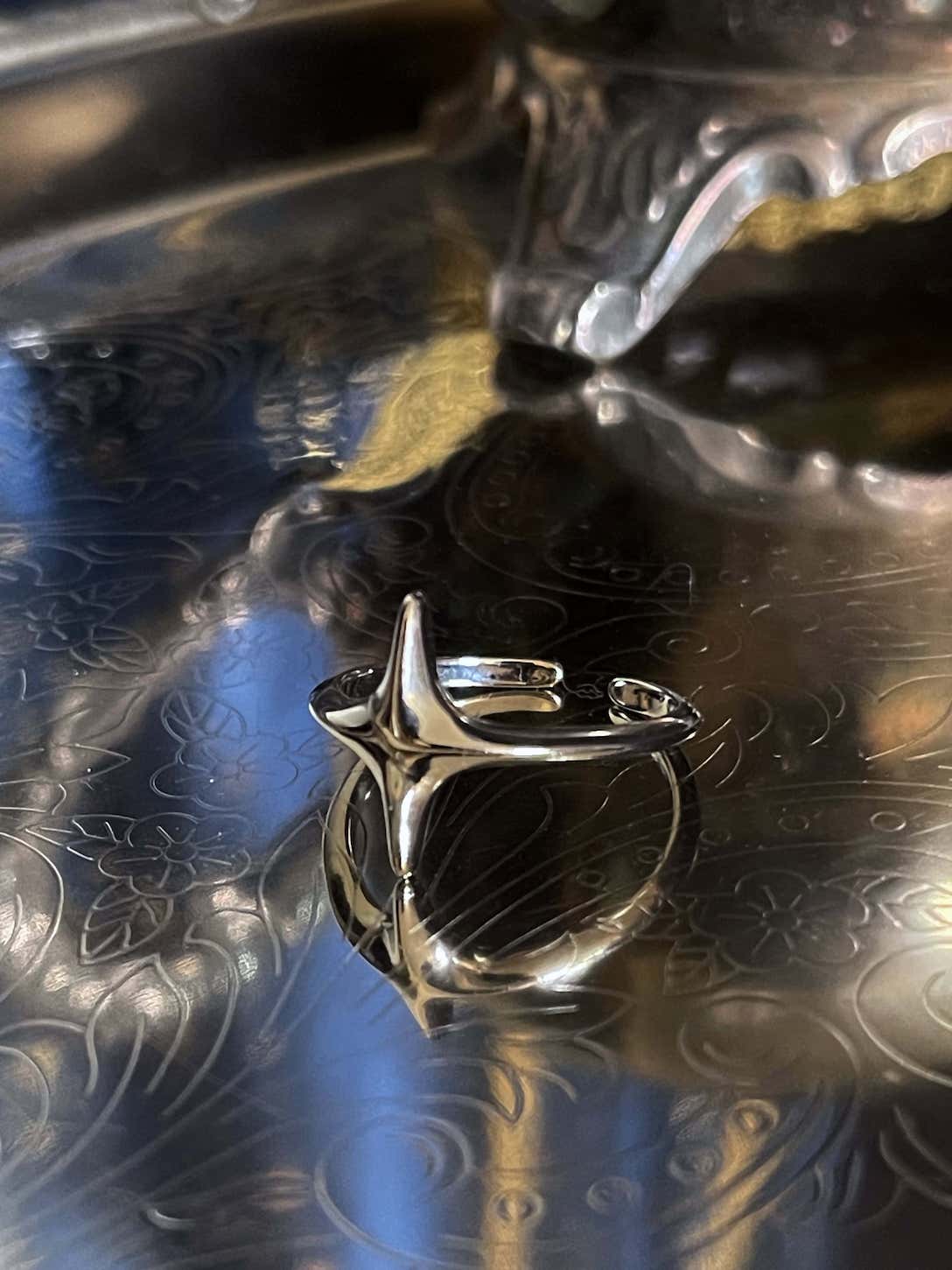 A Historically Inspired Celestial North Star Ring in Silver, adjustable band, nickel free.
