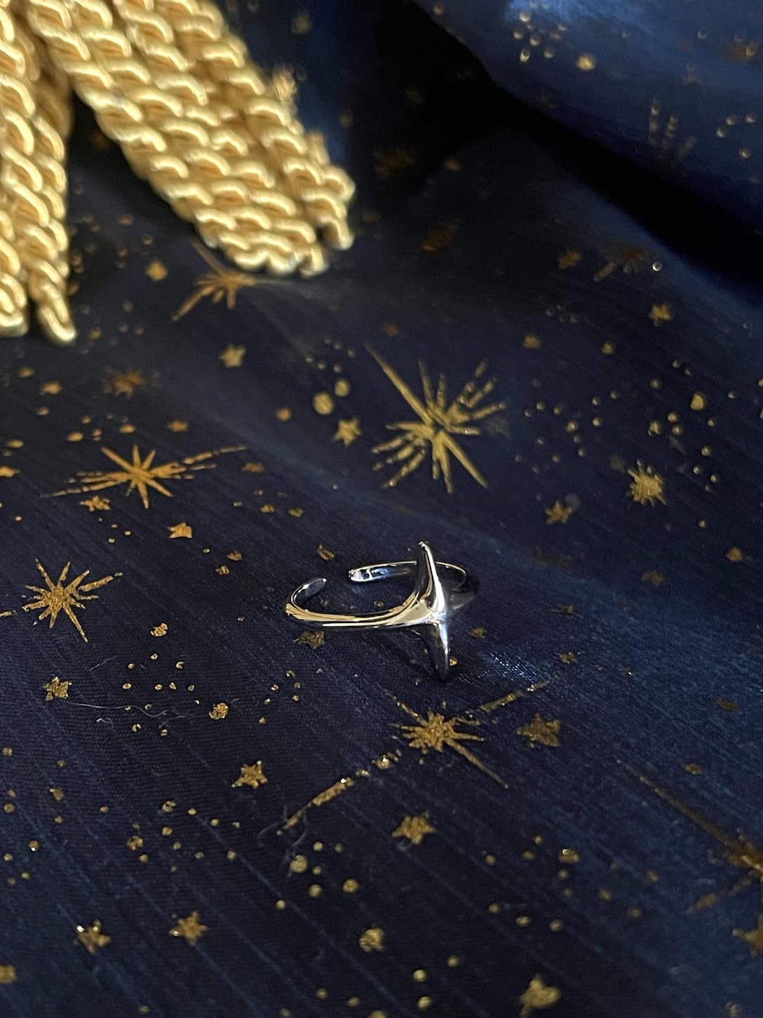 A Historically Inspired Celestial North Star Ring in Silver, adjustable band, nickel free.