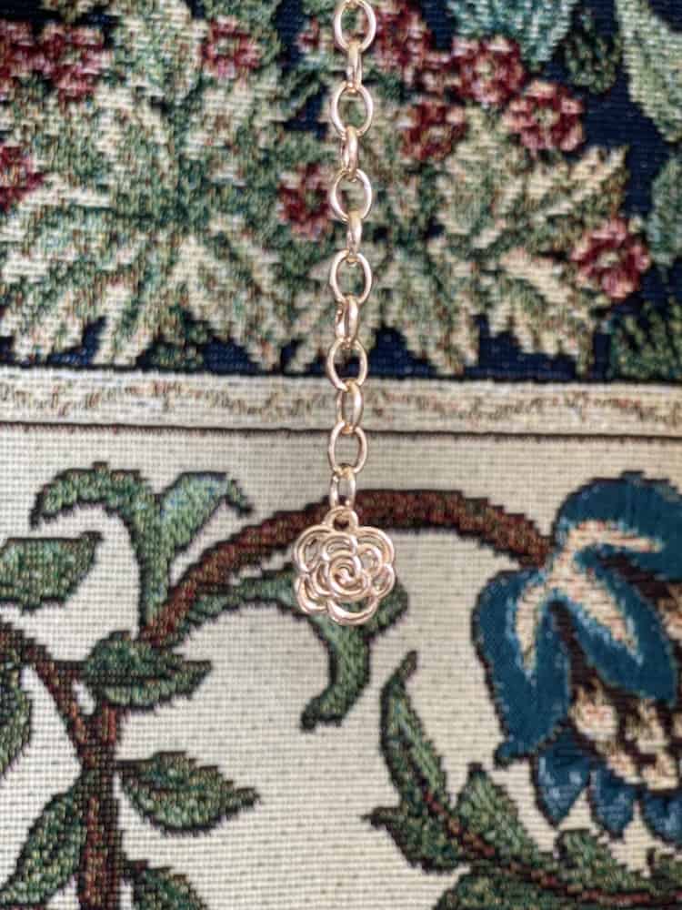 A Historically Inspired Renaissance and Medieval Classical Cameo Coin Belt in Gold on a mannequin.