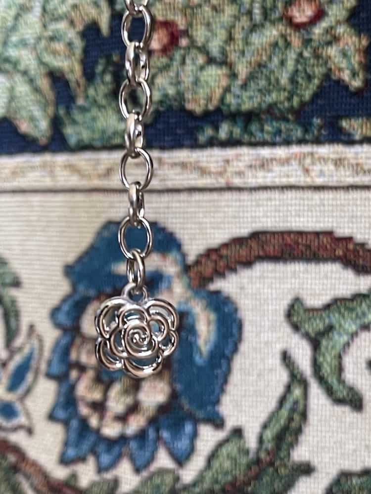 A Historically Inspired Renaissance and Medieval Classical Cameo Coin Belt in Silver pictured on a mannequin.
