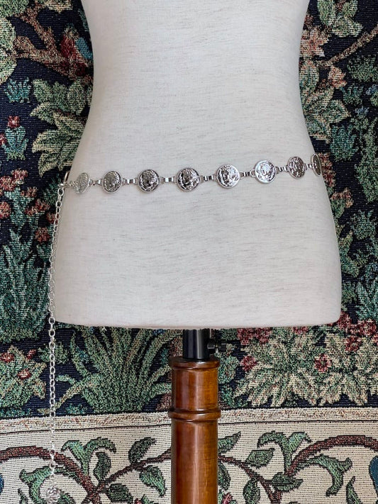A Historically Inspired Renaissance and Medieval Classical Cameo Coin Belt in Silver pictured on a mannequin.