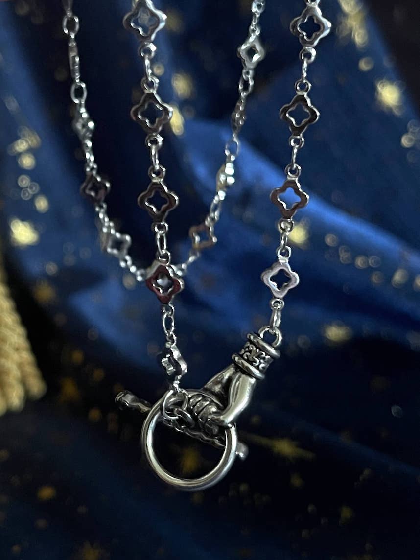 A Handmade Medieval Hand Toggle Clasp Necklace in Silver with Quatrefoil Motif Chain.