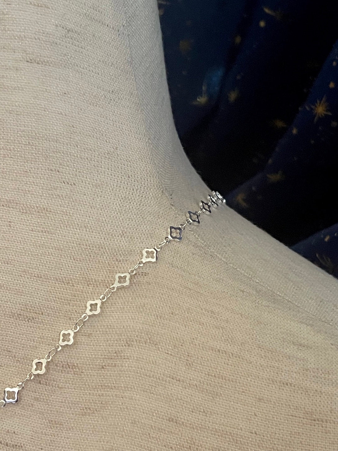 A Handmade Medieval Hand Toggle Clasp Necklace in Silver with Quatrefoil Motif Chain.