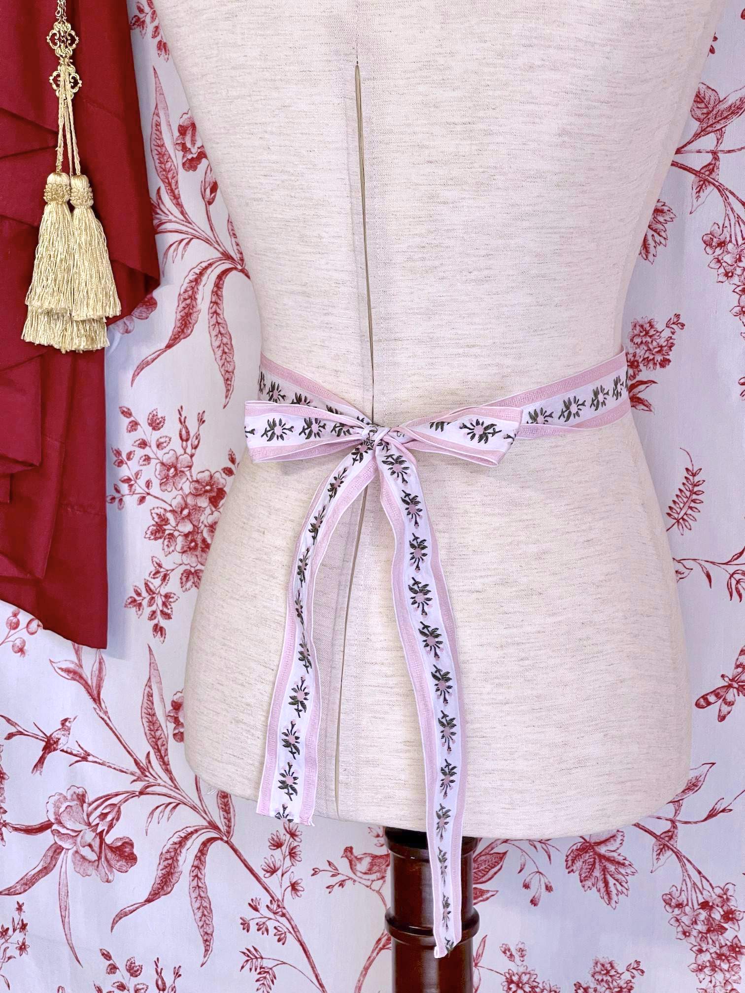 A Handmade Rococo and Regency Style Floral Ribbon Belt in Pink x White inspired by styles from the Rococo, Regency, Victorian, and Edwardian eras.