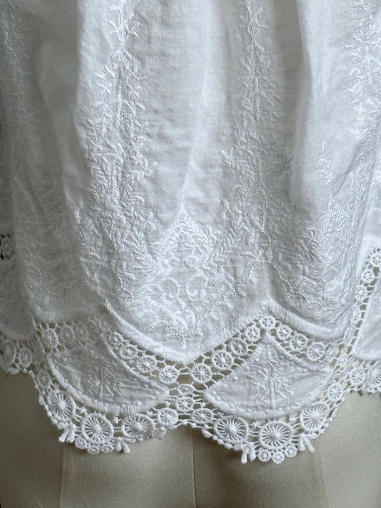 Embroidered lace details on the blouse