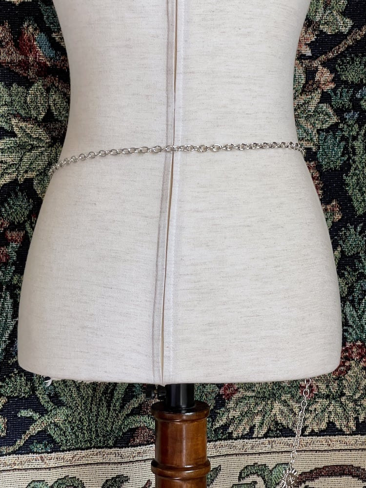 Historical Fantasy Inspired Celestial crescent Moon and Sun Belt in silver, pictured on a mannequin.