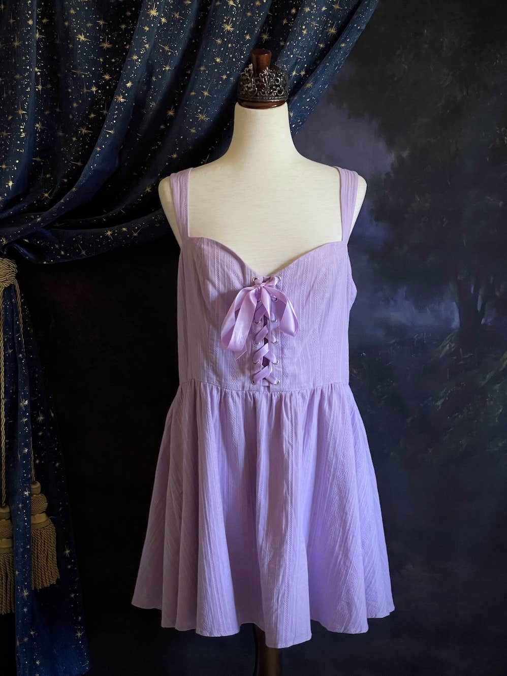 A Medieval Fantasy Corset-Laced Mini Dress in Lavender with Satin Ribbon and Sweetheart Neckline, and Skater Skirt.