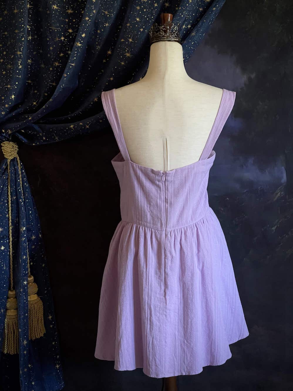 A Medieval Fantasy Corset-Laced Mini Dress in Lavender with Satin Ribbon and Sweetheart Neckline, and Skater Skirt.
