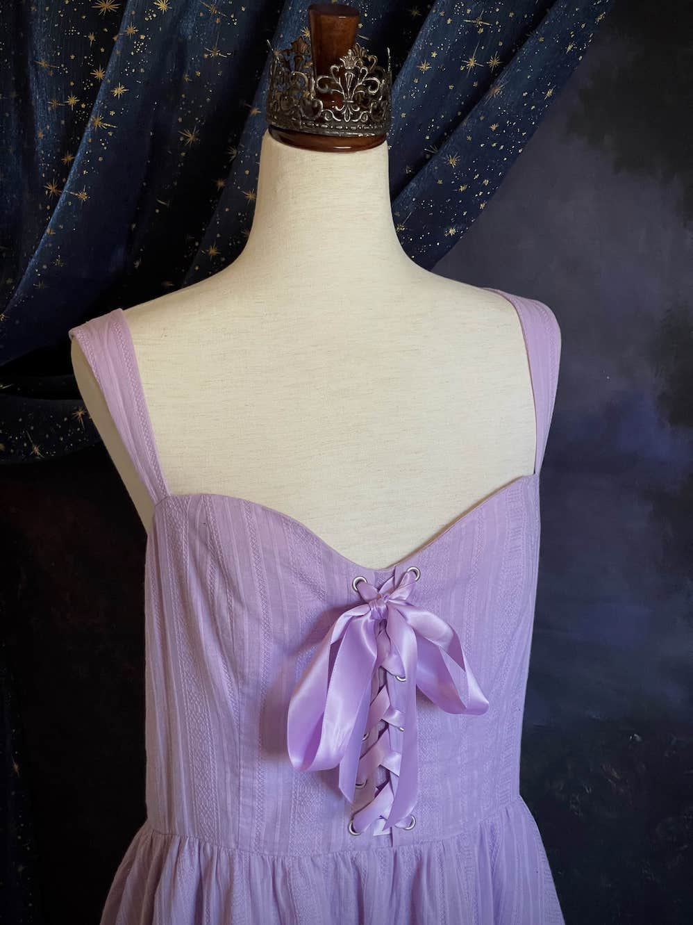 A Medieval Fantasy Corset-Laced Mini Dress in Lavender with Satin Ribbon and Sweetheart Neckline, and Skater Skirt.