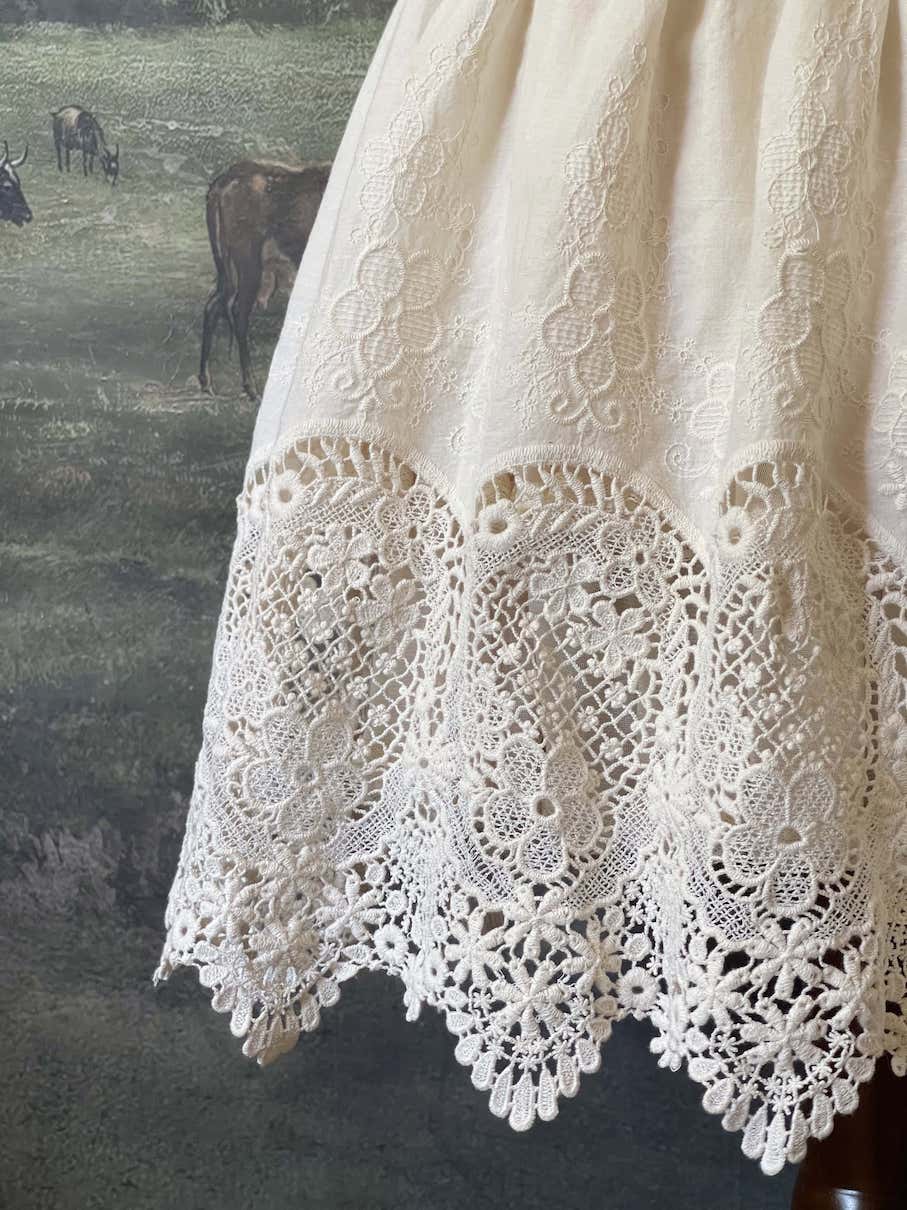 A historical fashion Edwardian & Victorian Inspired Floral Lace-Trimmed Mini Skirt in Ivory.