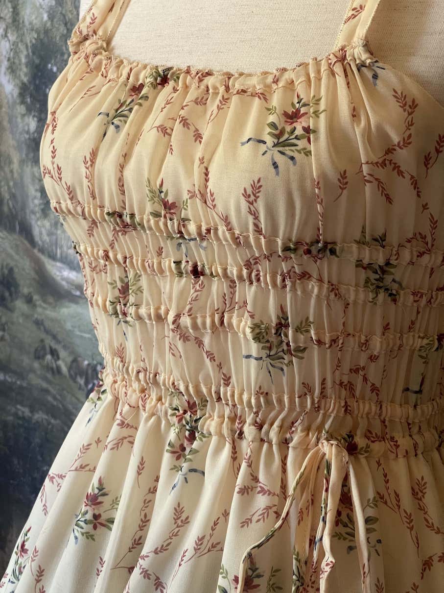 Historically Inspired vintage European style Ivory Floral Bouquet Print Maxi Dress with shirring bodice and drawstring adjustable waterfall skirt.