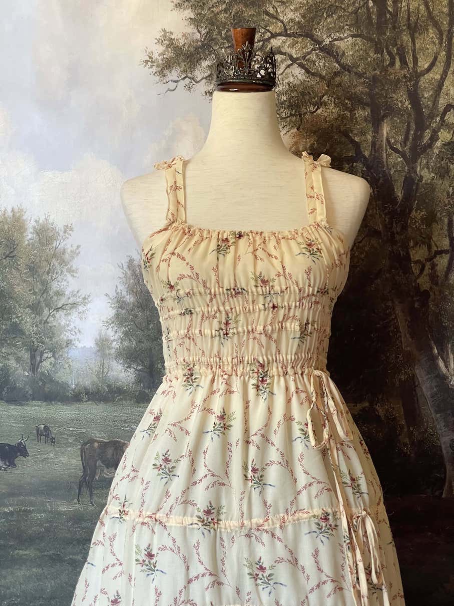 Historically Inspired vintage European style Ivory Floral Bouquet Print Maxi Dress with shirring bodice and drawstring adjustable waterfall skirt.