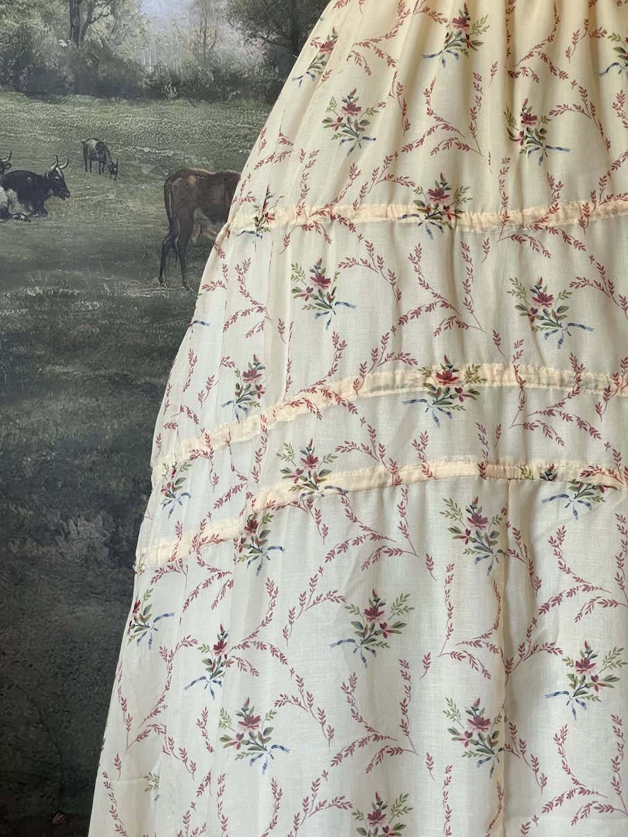 Historically Inspired vintage European style Ivory Floral Bouquet Print Maxi Dress with shirring bodice and drawstring adjustable waterfall skirt.