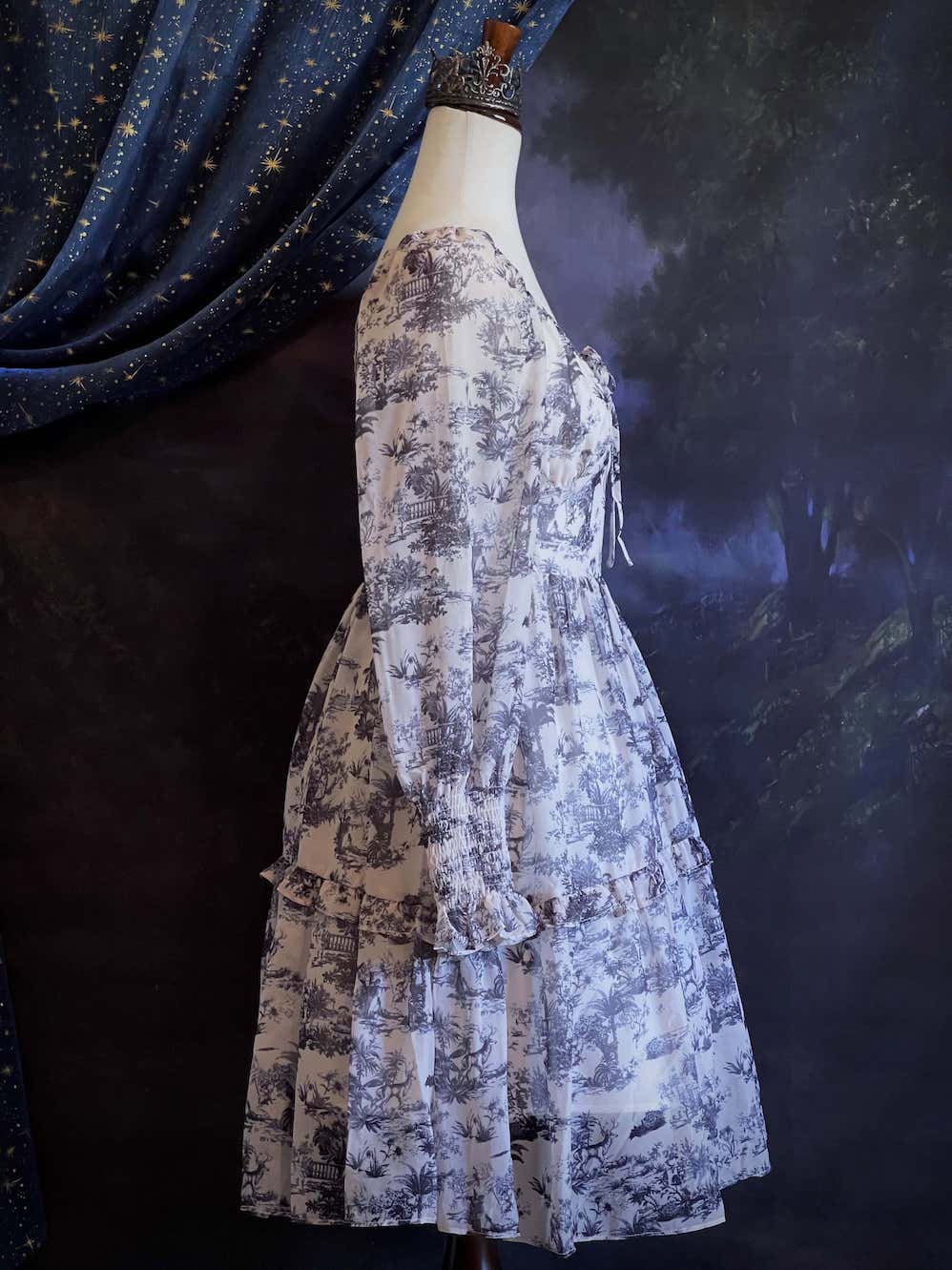 A Historically Inspired Rococo and Baroque style Blue & White Toile Print Bishop Sleeve Mini Dress with Ruffle Trim and Gathered Cuffs