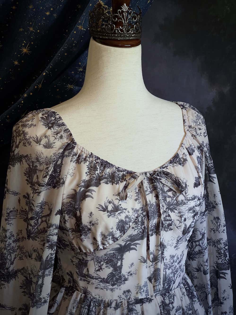 A Historically Inspired Rococo and Baroque style Blue & White Toile Print Bishop Sleeve Mini Dress with Ruffle Trim and Gathered Cuffs