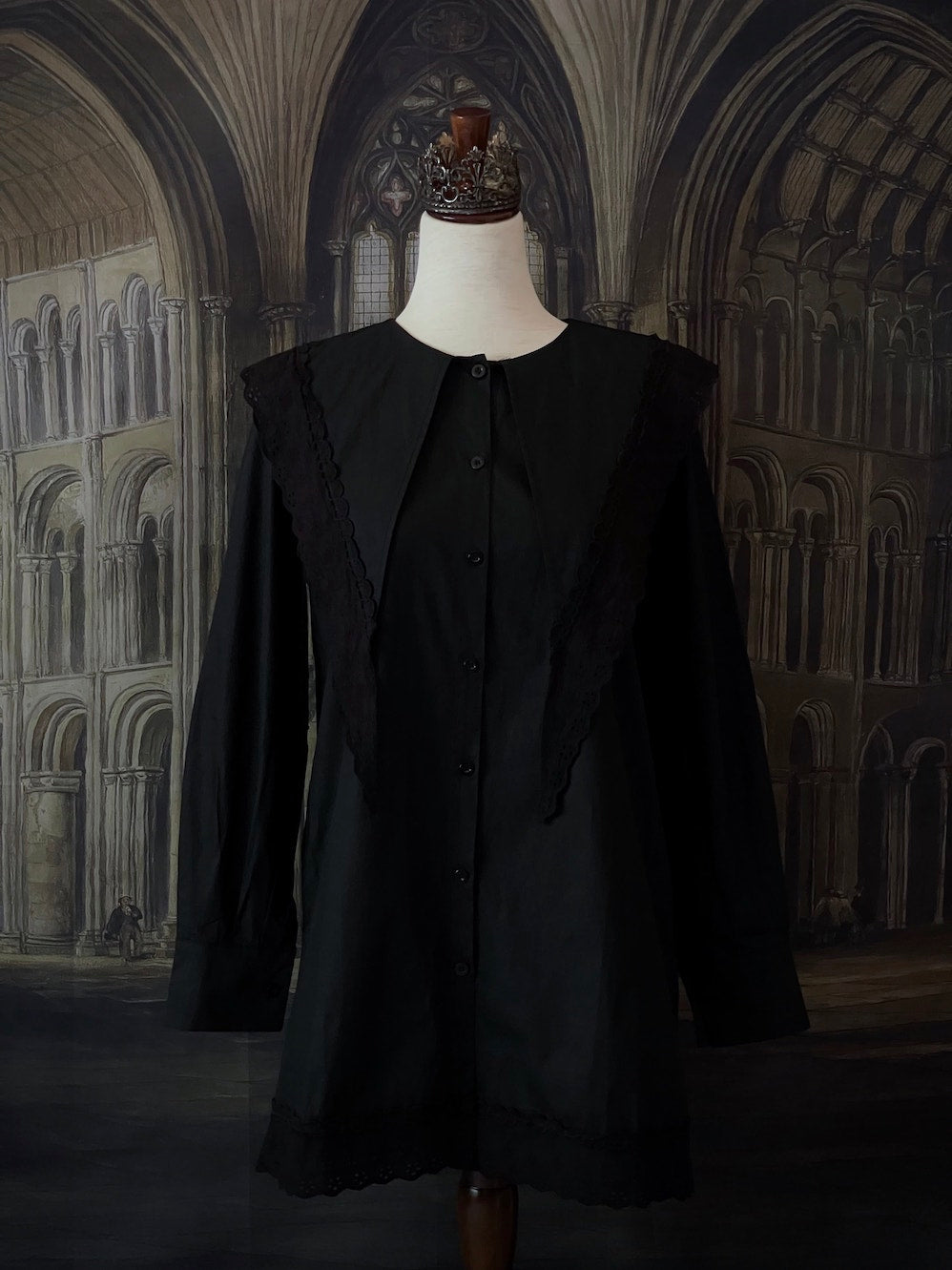 A Historically Inspired Medieval and Victorian Gothic Dagger Collar Tunic Blouse in Black with Lace Trim and Long Sleeves.