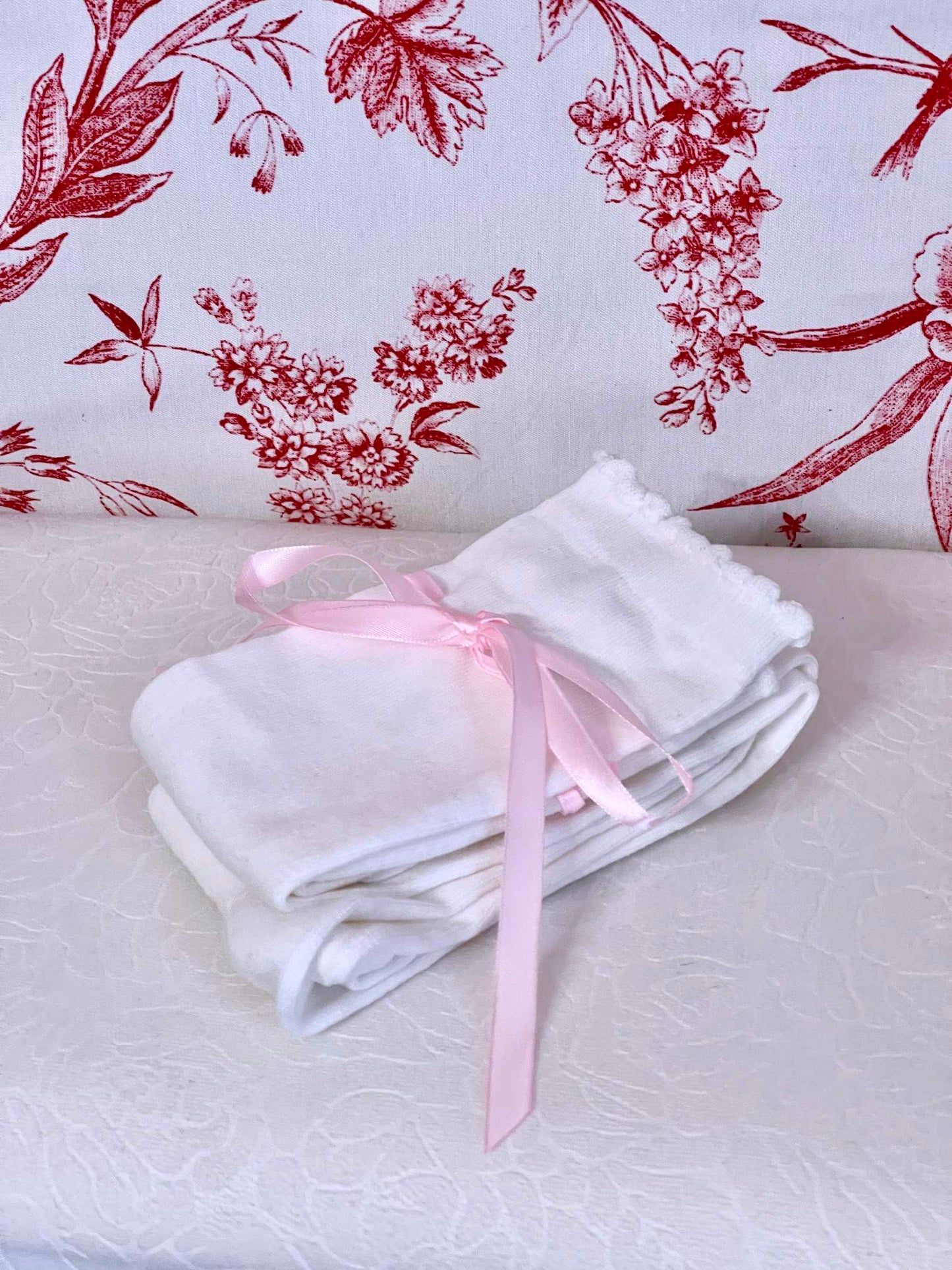 A pair of Historically Inspired Cotton Knee-High Socks with Ribbon Lacing in White and Pink, for Medieval, Renaissance, Baroque, Rococo, Regency, Victorian, or Edwardian fashion.