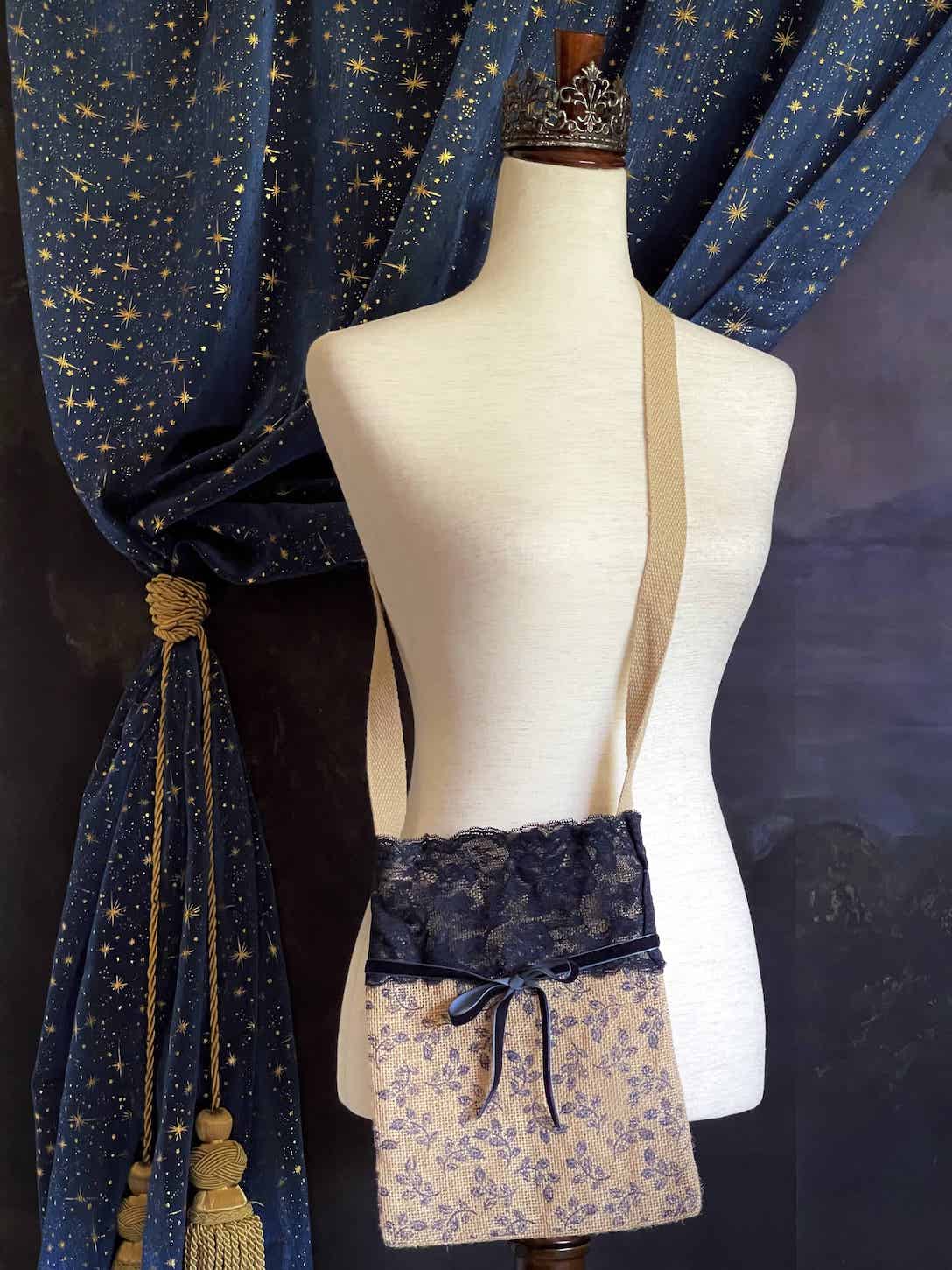 A Handmade Lace-Trimmed Jute Crossbody Bag in Navy Blue, vintage style cottagecore folk purse.