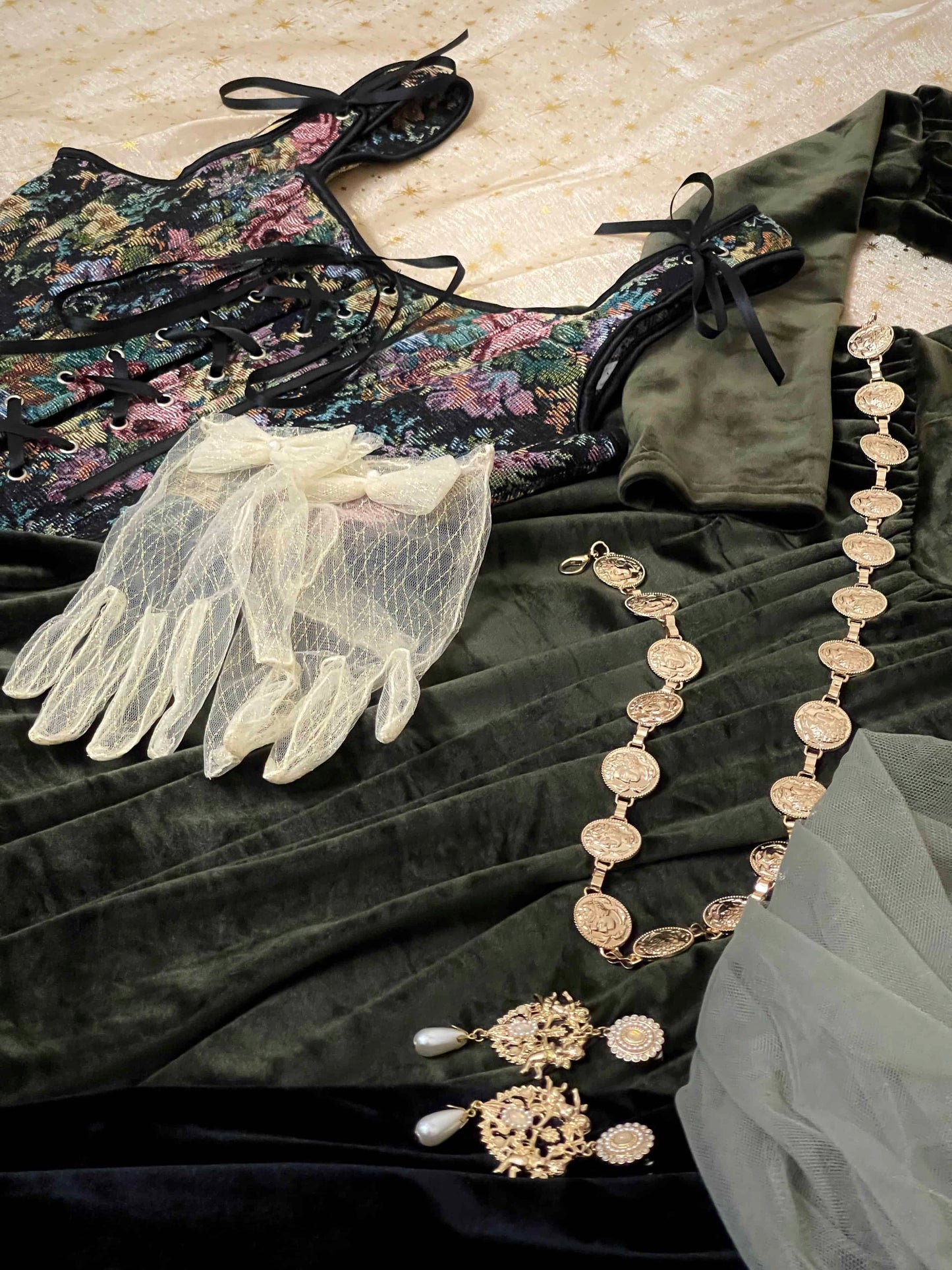 Detail of a historical fashion clothing and accessories style bundle mystery bag, including medieval, renaissance, baroque, tudor, rococo, regency, Victorian, Edwardian and fantasy styles.