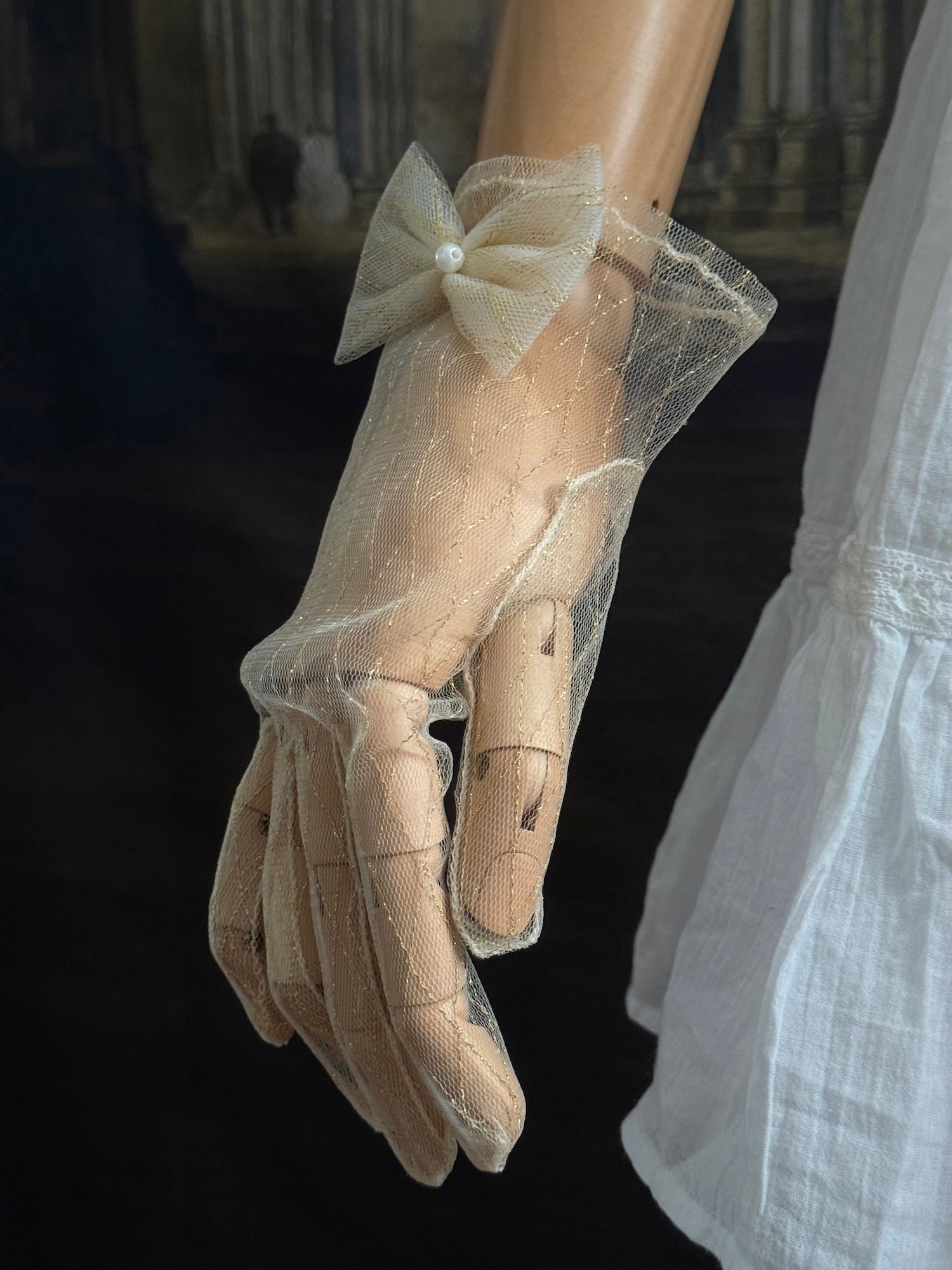 A Pair of Historically Inspired Sheer Lace Gloves with Bow Detail in Champagne Gold. Renaissance, regency, rococo, Victorian era gloves.