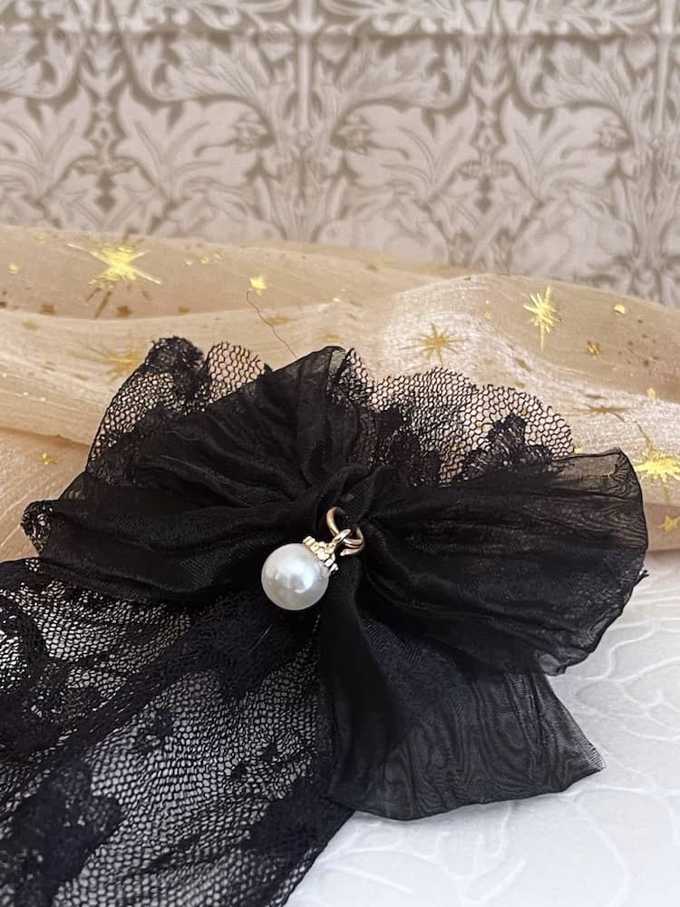 Historically Inspired Regency and Victorian era Floral Lace Gloves with Bow & Pearl Details in Black. Detail.