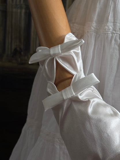A Pair of Historically Inspired Regency and Rococo Era Satin Silk Gloves with Bow Details in White.