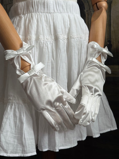 A Pair of Historically Inspired Regency and Rococo Era Satin Silk Gloves with Bow Details in White.