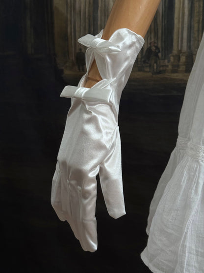 A Pair of Historically Inspired Regency and Rococo Era Satin Silk Gloves with Bow Details in White.