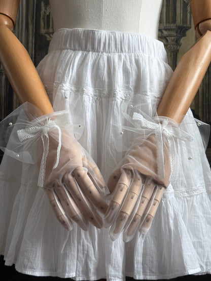 A Pair of Historically Inspired Sheer Gloves with Lace Bow Detail in White, with pearl accents. Perfect for regency, rococo, Victorian, and Edwardian eras.