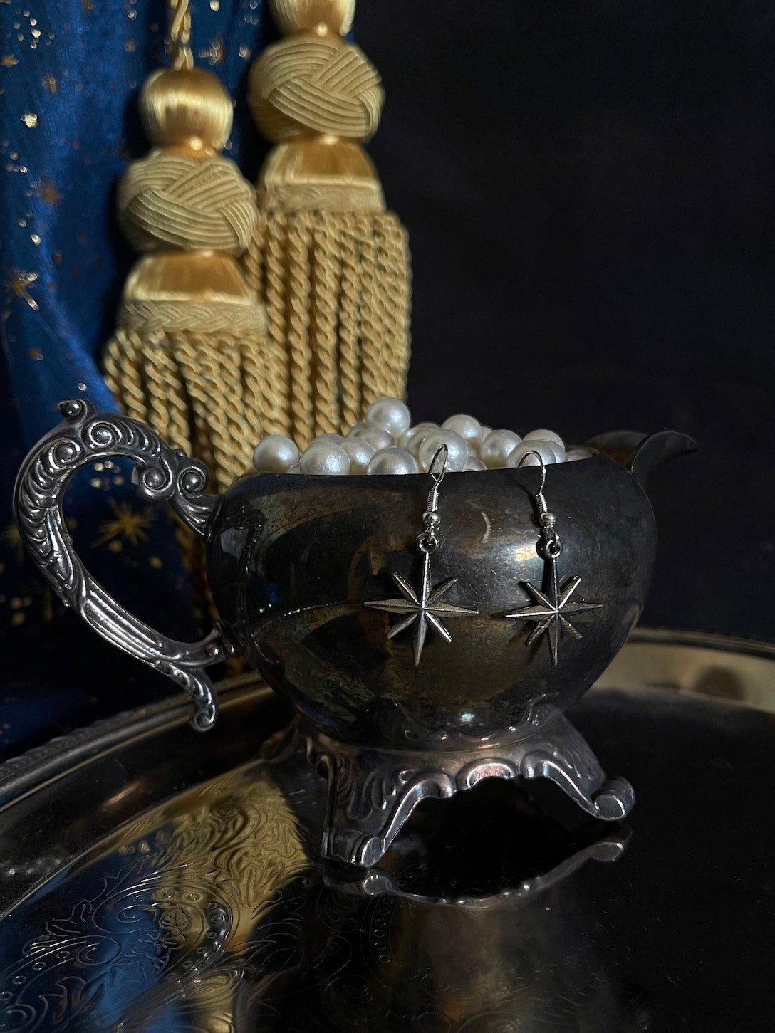 A pair of Handmade Medieval Inspired North Star Earrings in Aged Silver, dangly charms.