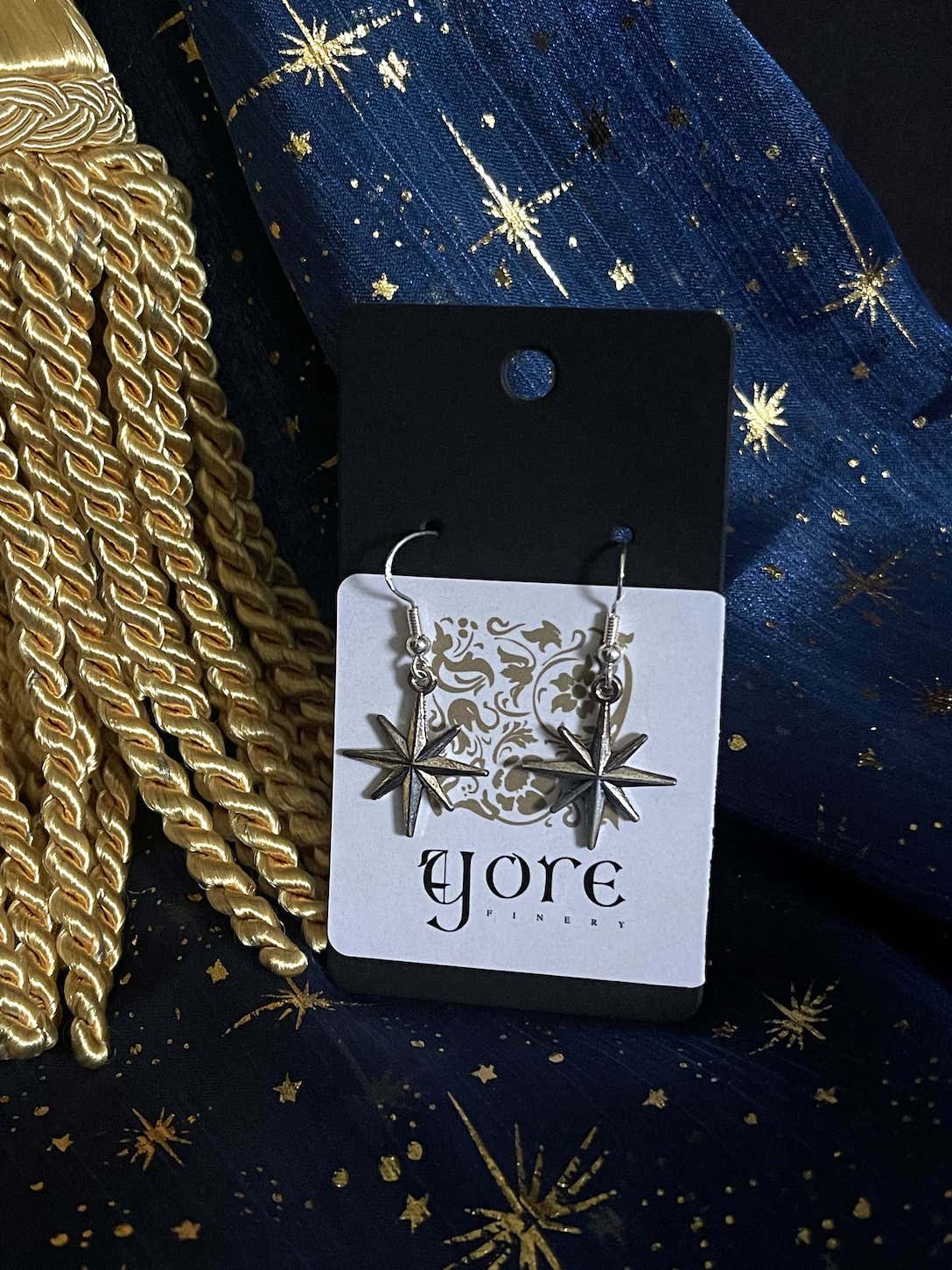 A pair of Handmade Medieval Inspired North Star Earrings in Aged Silver, dangly charms.